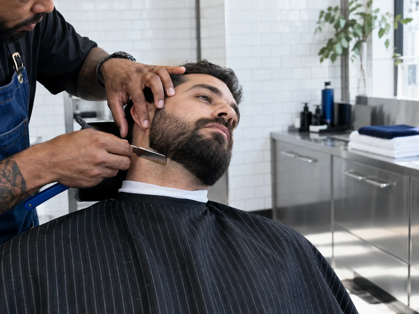 Barber refining beard detail